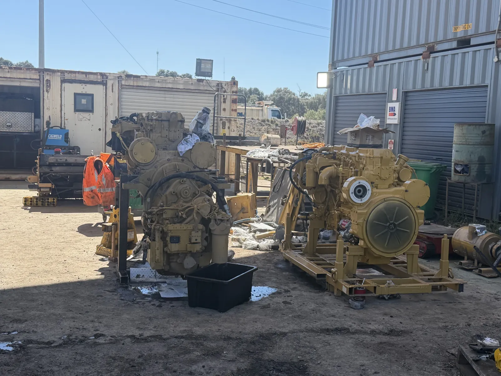 Engines staged for rebuild in the yard