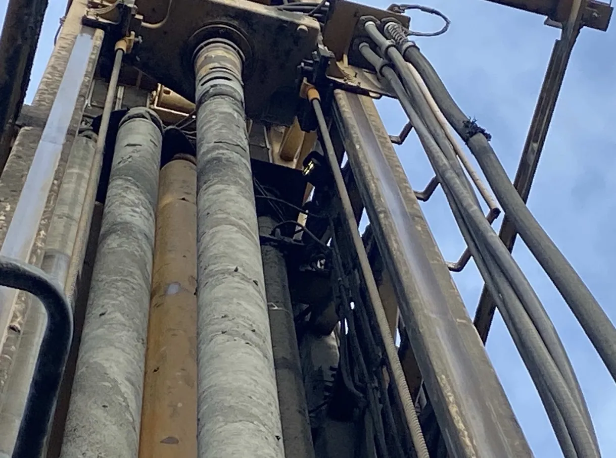 Hydraulic lines running up a rig mast
